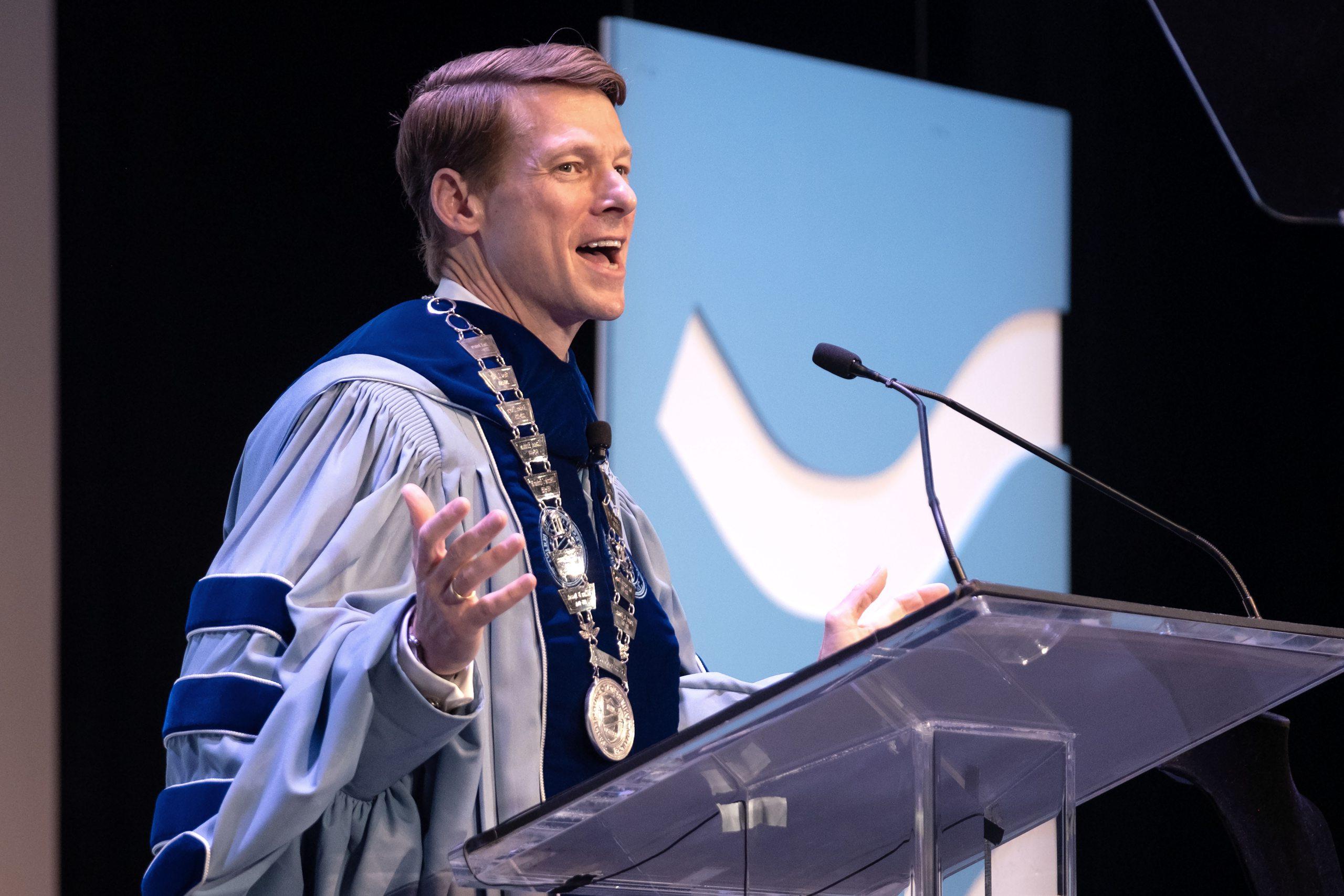 Chancellor Lee H. Roberts giving a speech during his installation on the stage at Memorial Hall on the campus of UNC-Chapel Hill.